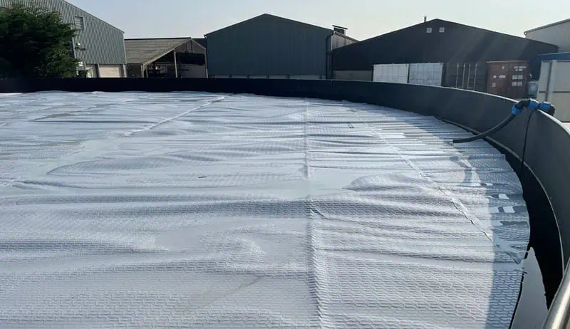 Sitetech | Services Industrial rooftop with white reflective membrane coating